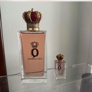 Dolce & Gabbana pink perfume bottle with gold crown cap